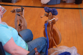Woman sitting at Majacraft wheel